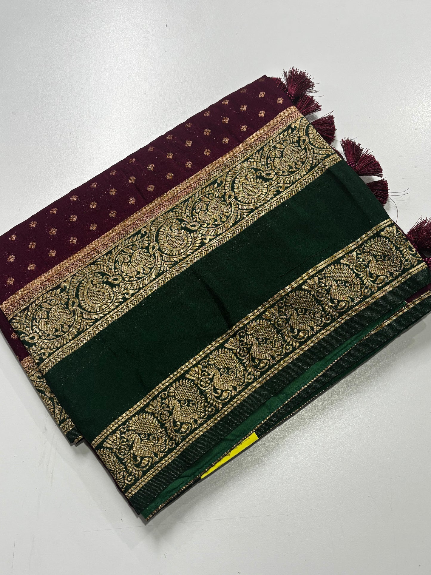 Gracefully Crafted Wine Banarasi Soft Silk Saree with Green Zari Border, Pallu, Tassels & Blouse