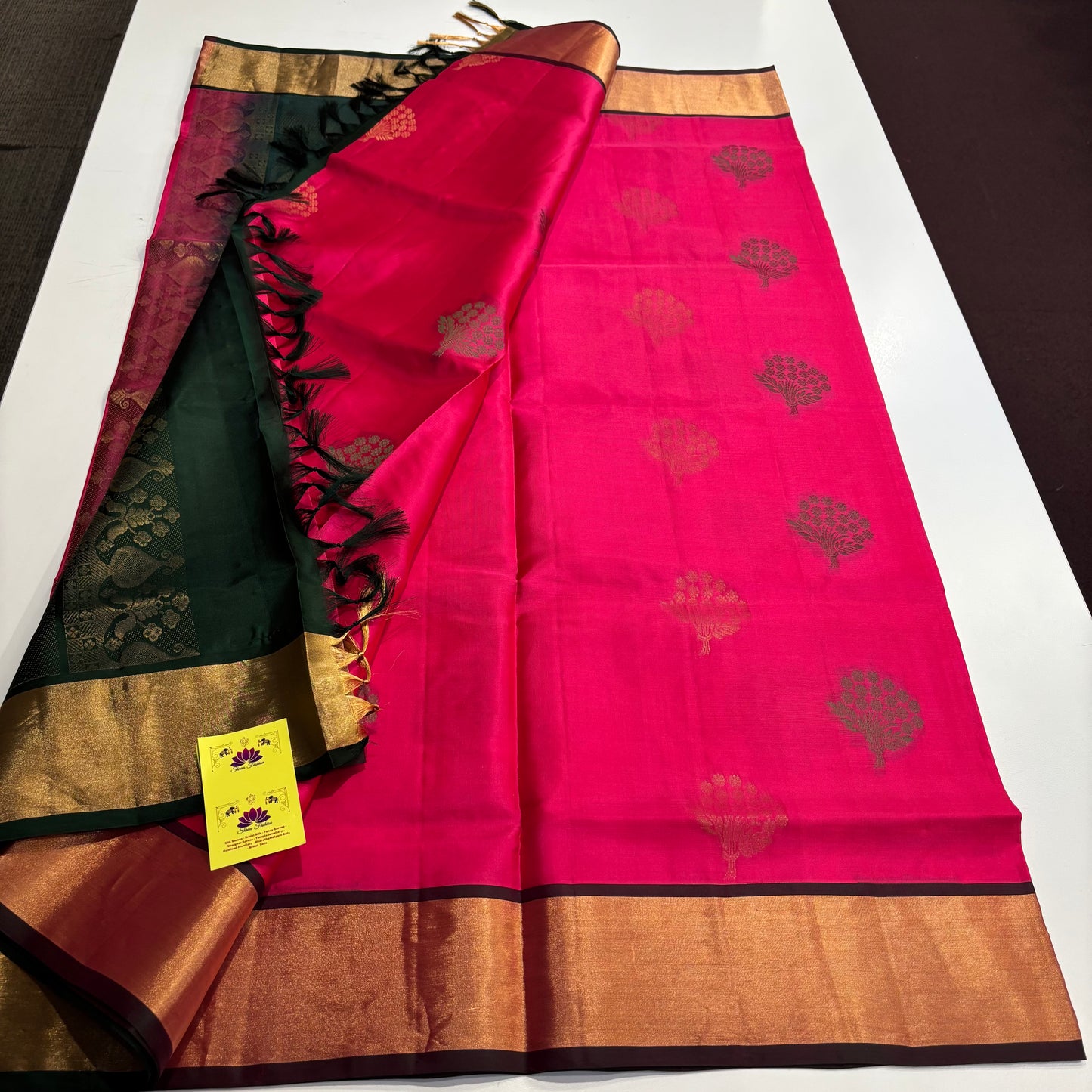 Handwoven Kanchipuram Silk Saree in Rani Pink and Bottle Green with Gold Zari Work