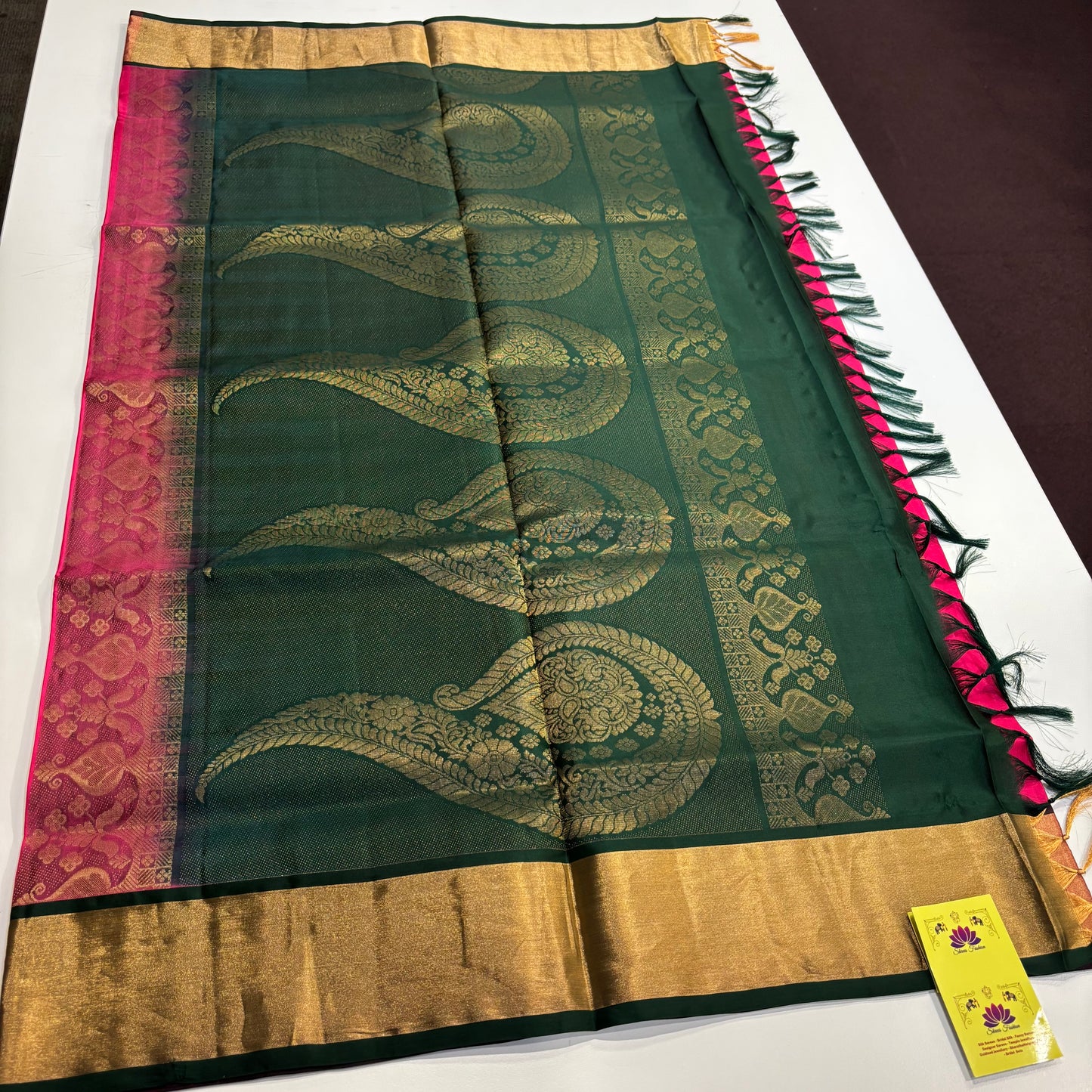 Handwoven Kanchipuram Silk Saree in Rani Pink and Bottle Green with Gold Zari Work