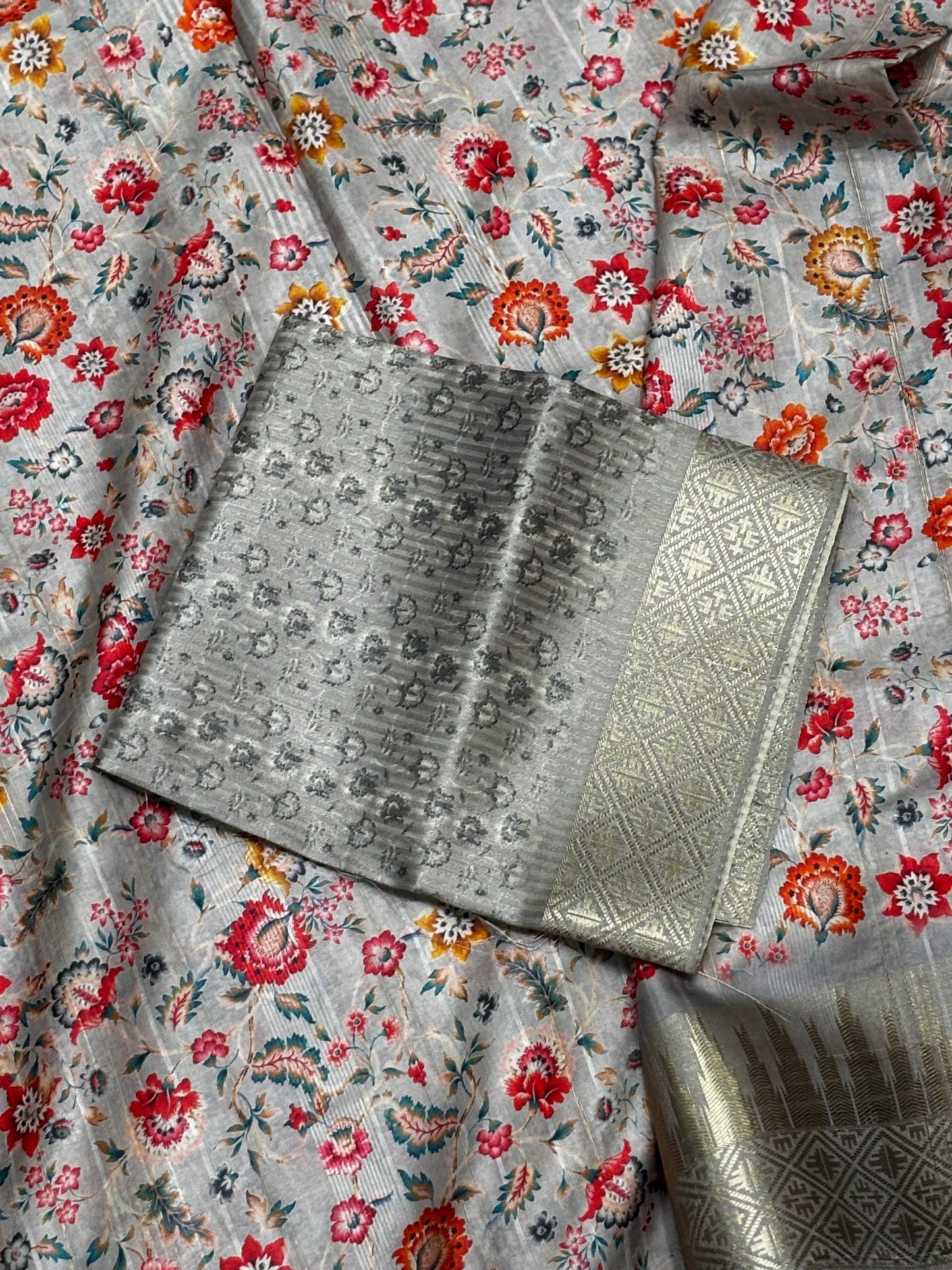 Elegant Light Grey Banarasi Tussar Saree Featuring Floral print and Golden Border