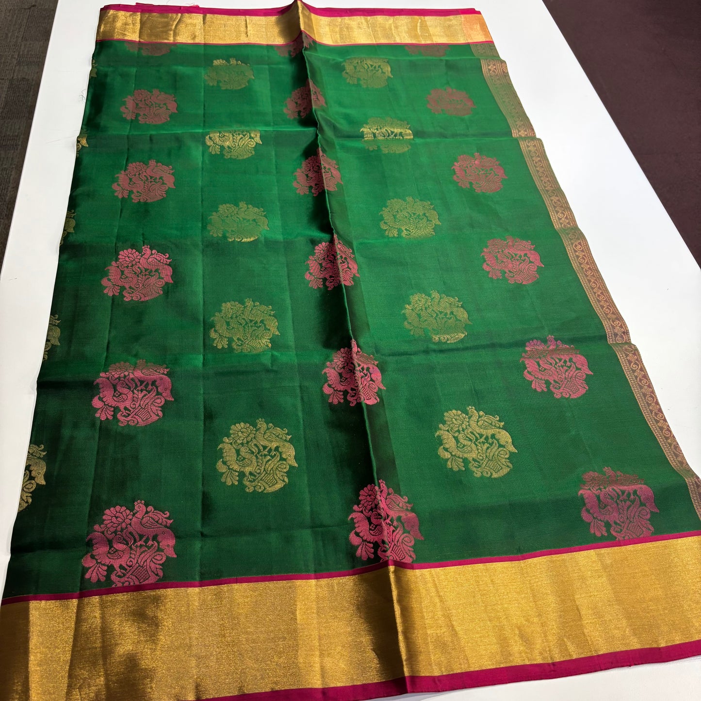Heritage Elegance – Pure Kanchipuram Saree in Bottle Green with Magenta Zari