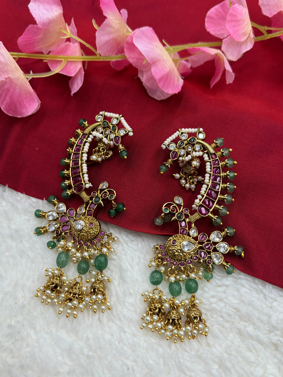 Peacock‑Style Jhumka Earcuff with Ruby, Green Beads & Pearl Drops – Antique Gold Finish