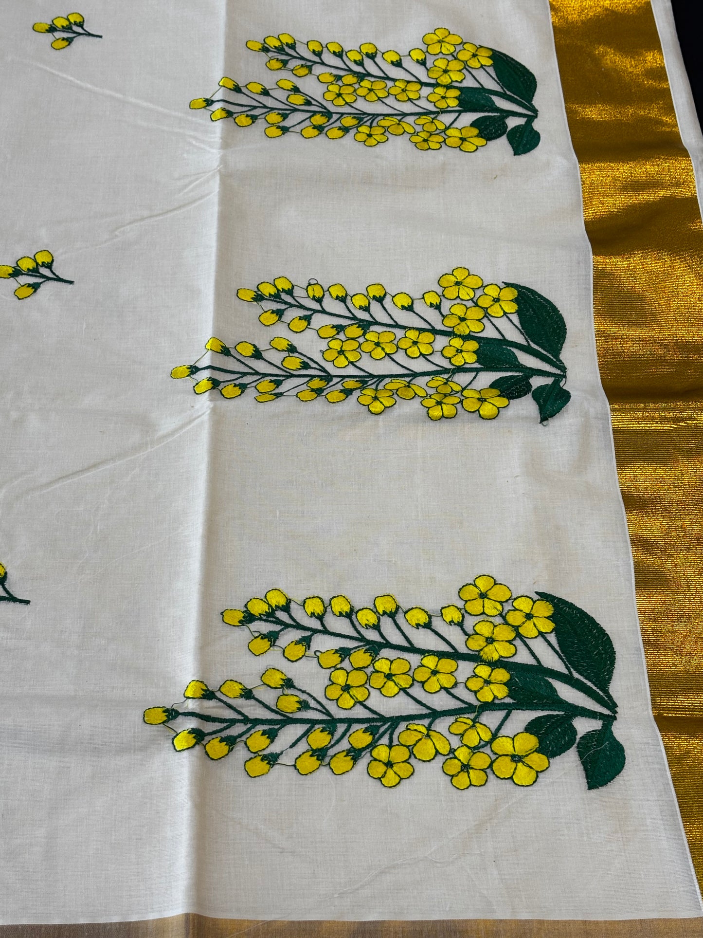 Kerala Kasavu saree with yellow floral embroidery and gold border – view 5