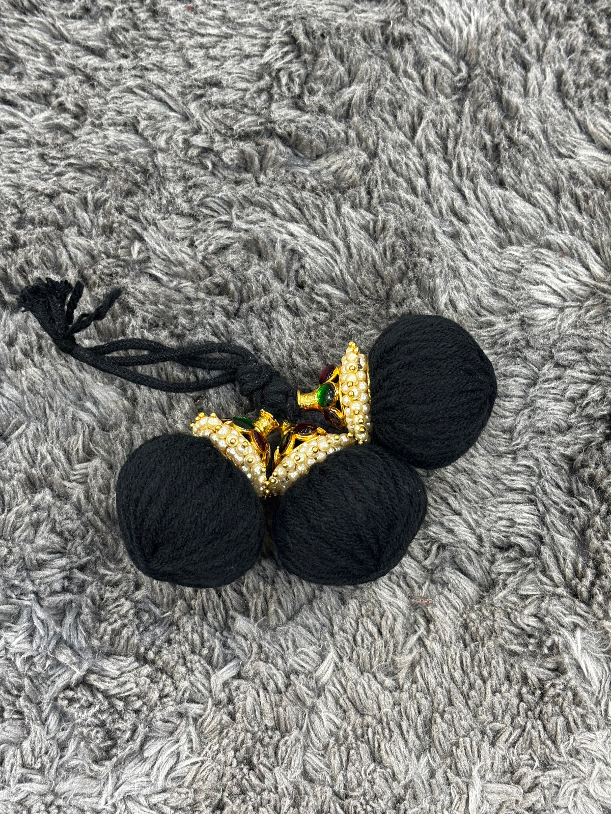 Traditional Kemp Stone Ball Kunjalam for Bharatanatyam braid styling.