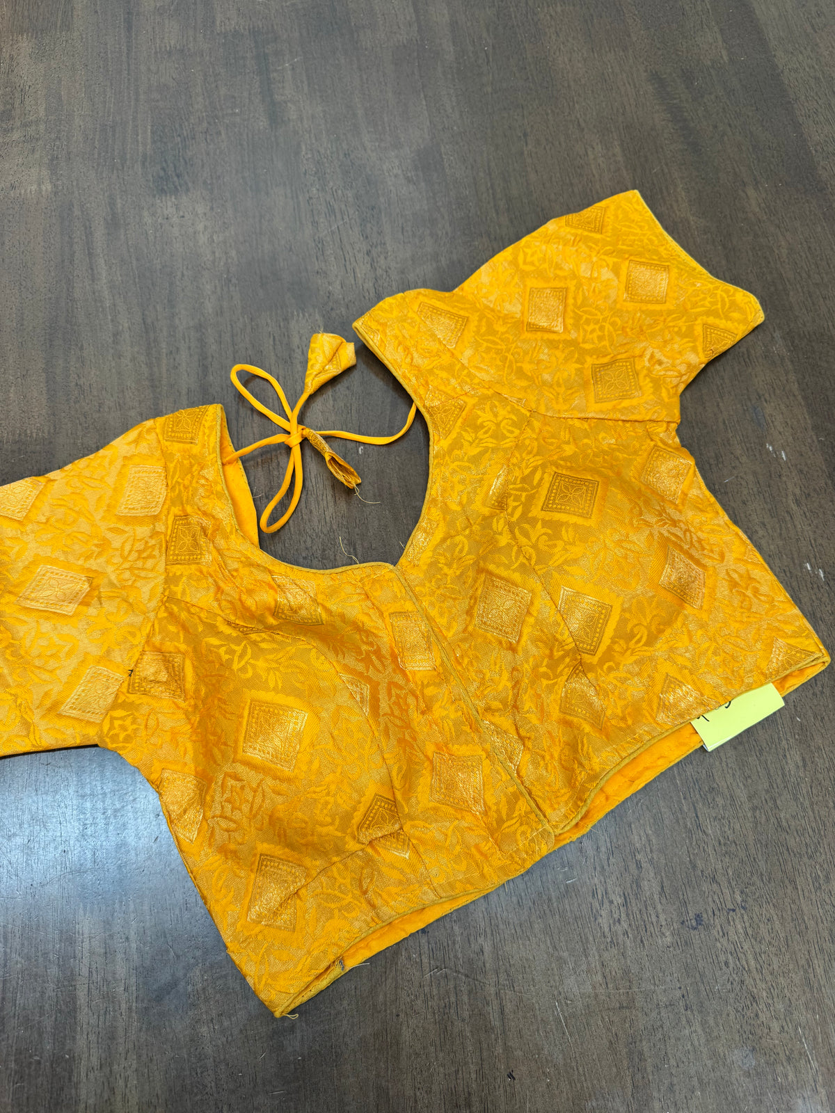 Yellow Brocade Saree Blouse with Detailed Gold Diamond‑Shape Design