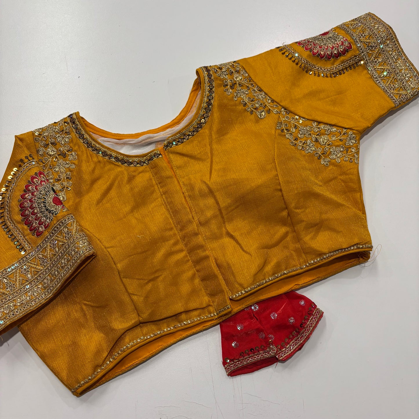 Festive Yellow Blouse with Contemporary Back Design