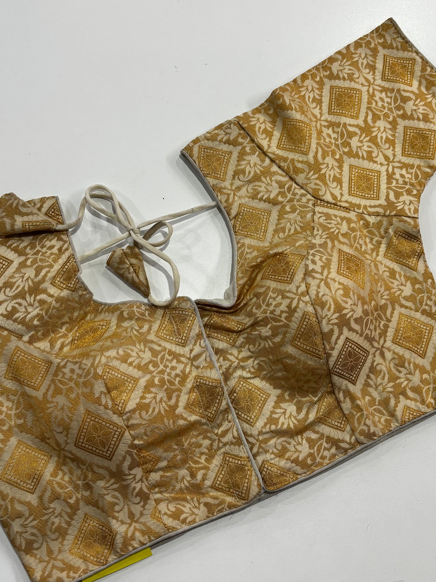Radiant Cream White Brocade Blouse with Luxurious Golden Finish and Front Hook Closure