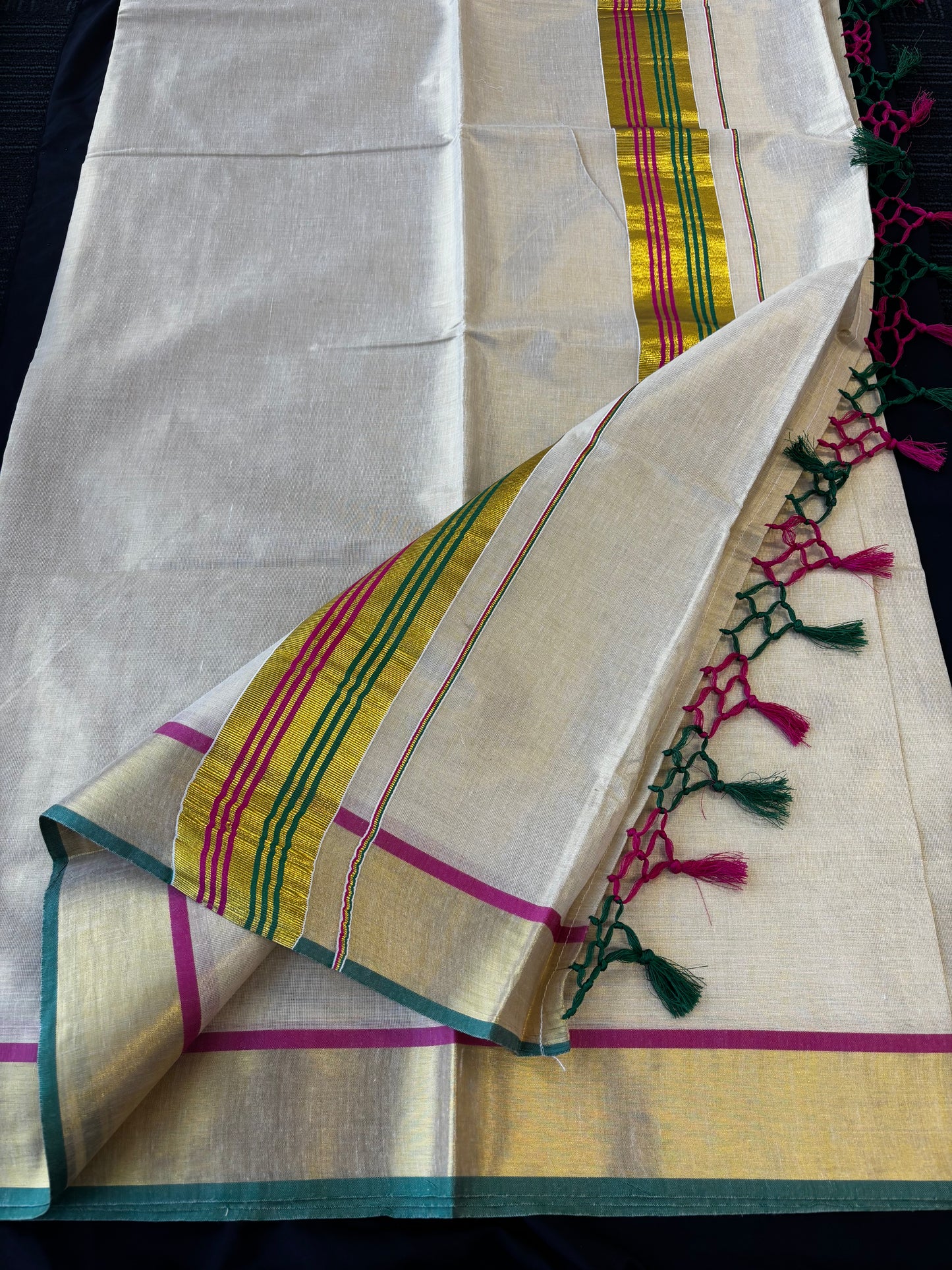Kerala Kasavu tissue saree with multicolour magenta and green border