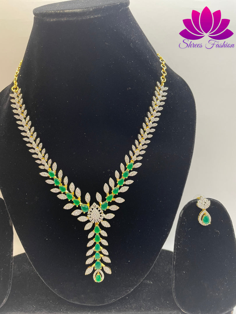 Gold-Plated Leaves Design Necklace with Green and White Stone Embellishments | Shrees Fashion