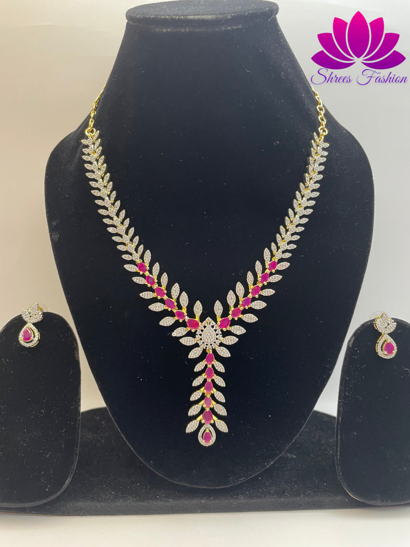 Gold-Plated Leaves Design Necklace with Pink and White Stone Embellishments | Shrees Fashion