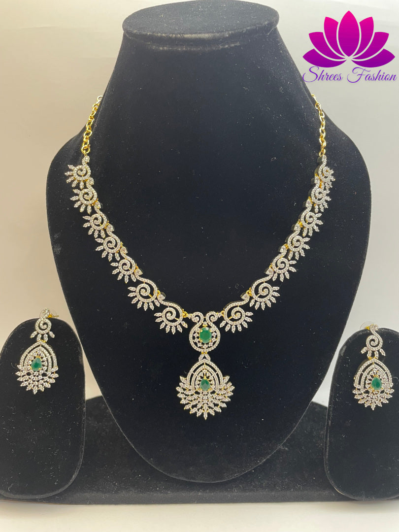 Radiant Elegance Gold-Plated American Diamond Necklace with Central Green Stone | Shrees Fashion