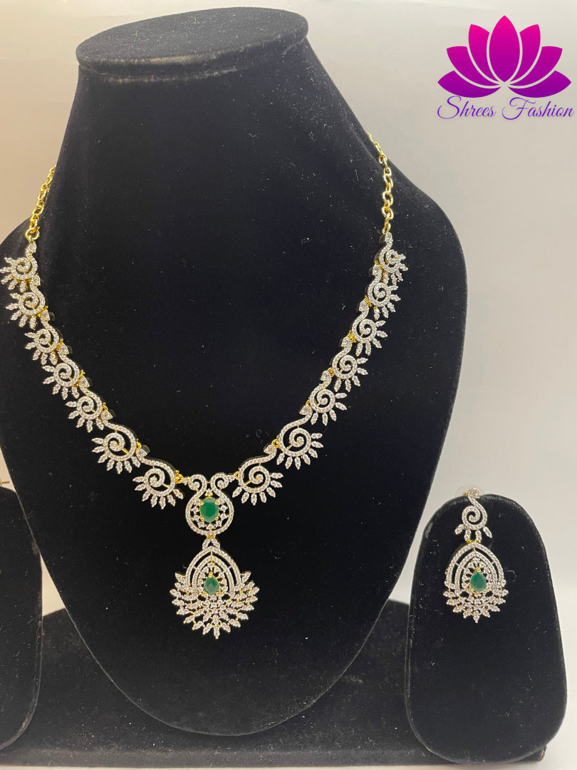 Radiant Elegance Gold-Plated American Diamond Necklace with Central Green Stone | Shrees Fashion