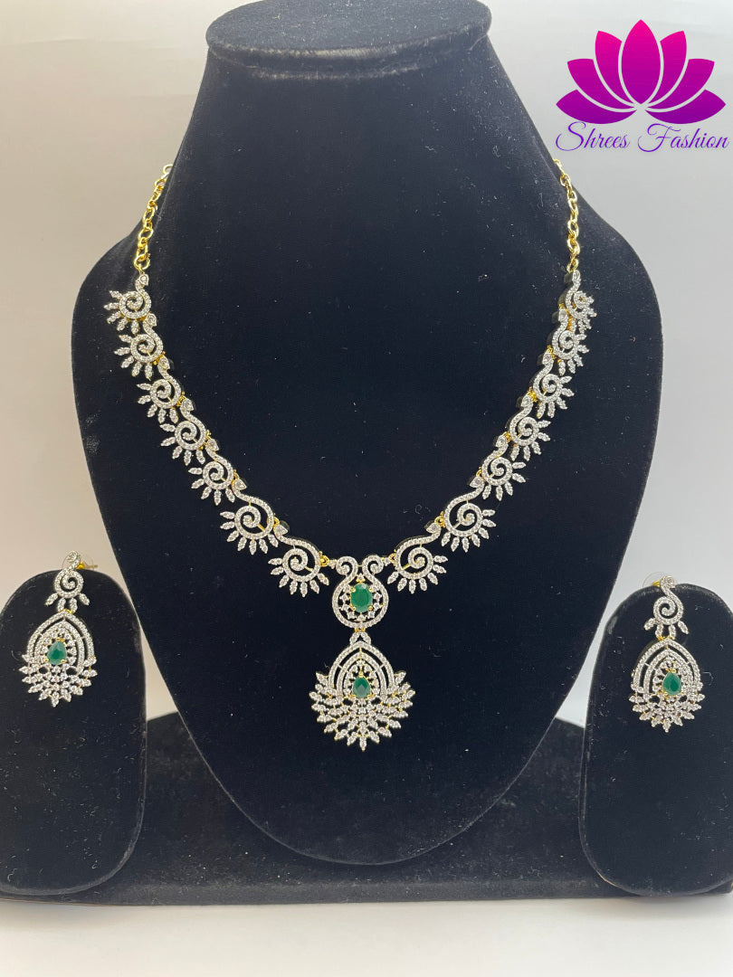 Radiant Elegance Gold-Plated American Diamond Necklace with Central Green Stone | Shrees Fashion